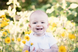 baby in field of yellow wildflowers in northern arizona