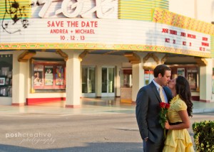 save the date with romantic kiss in front of fox theater in bakersfield
