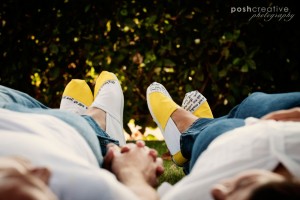 custom Toms shoes with quotes and yellow laying in grass